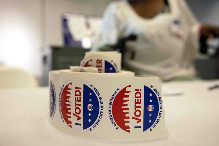 Voting stickers sit on a a table during Primary Election Day on August 23rd, 2022 in New York.